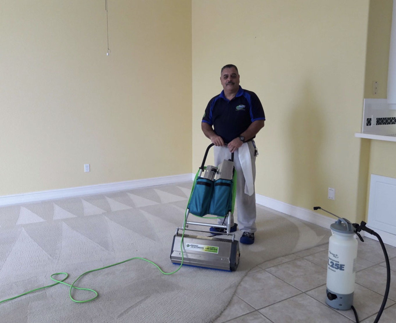 Ed from My Cleaner with professional carpet cleaning equipment
